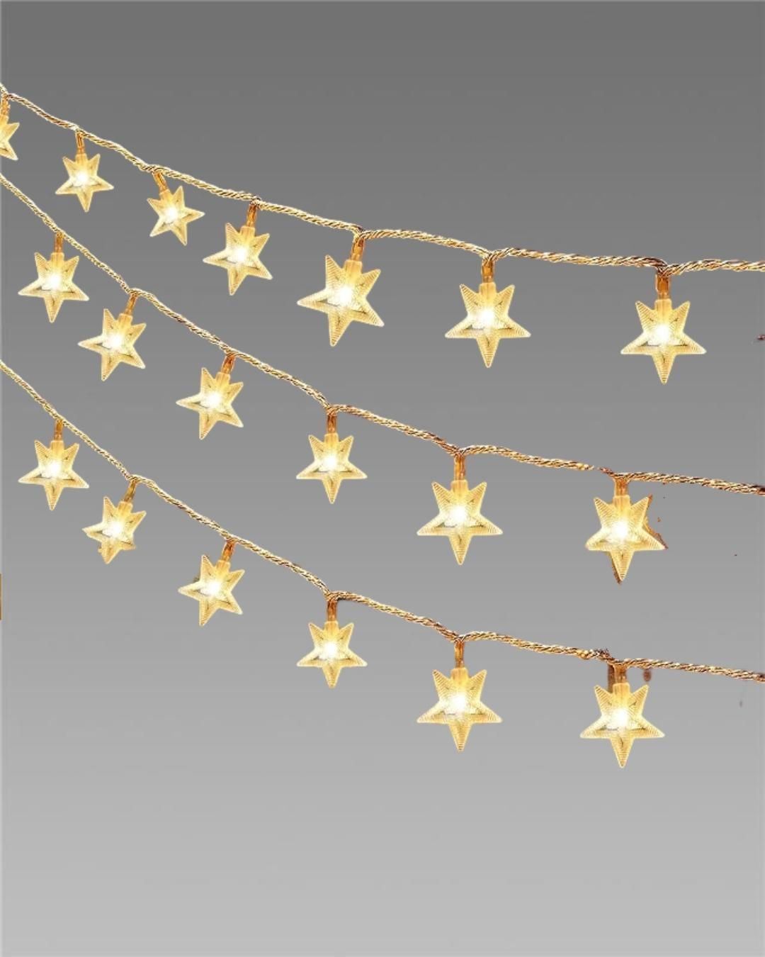 Star-shaped string lights on a gray background