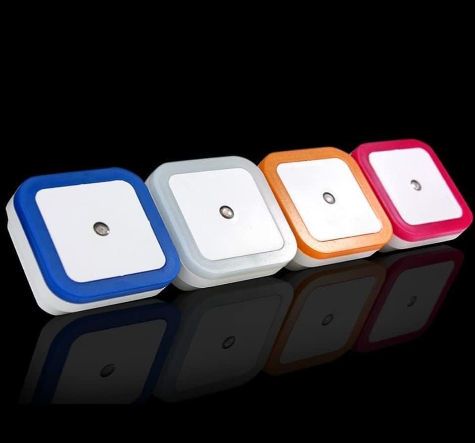 Five square night lights in blue, gray, orange, and pink on a black background