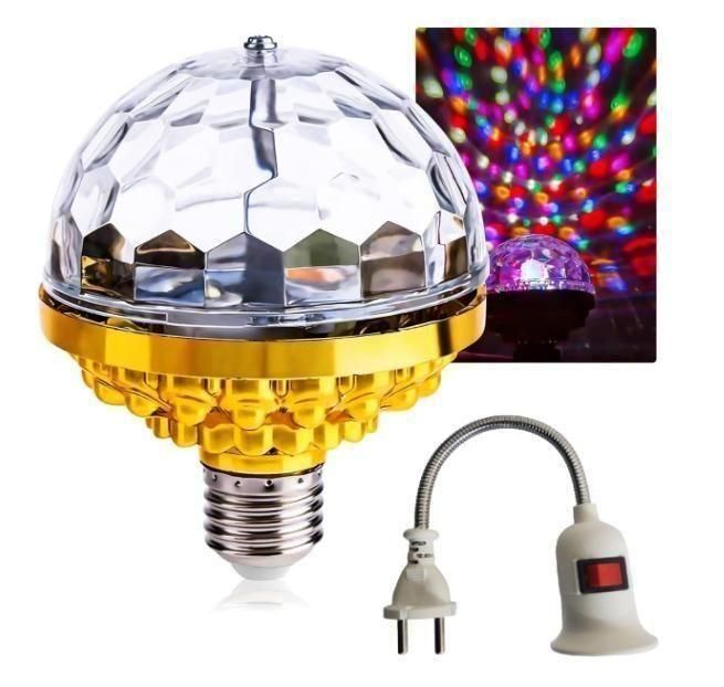 Dance ball light with yellow base and clear top, plug, and socket 