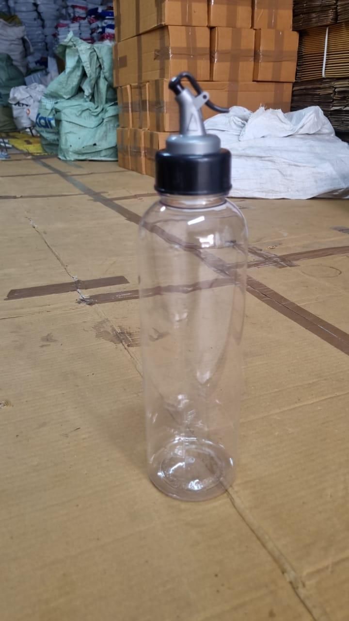 Clear plastic bottle with black cap 